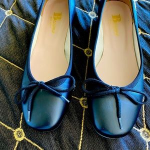 Black leather ballet flats